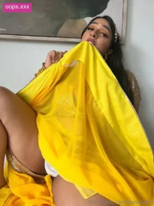 Punjabi baddie Rakhi Gill strips yellow saree for Onlyfans nude pics